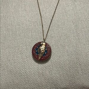 Gold Pendant Necklace with Red and Blue Accents